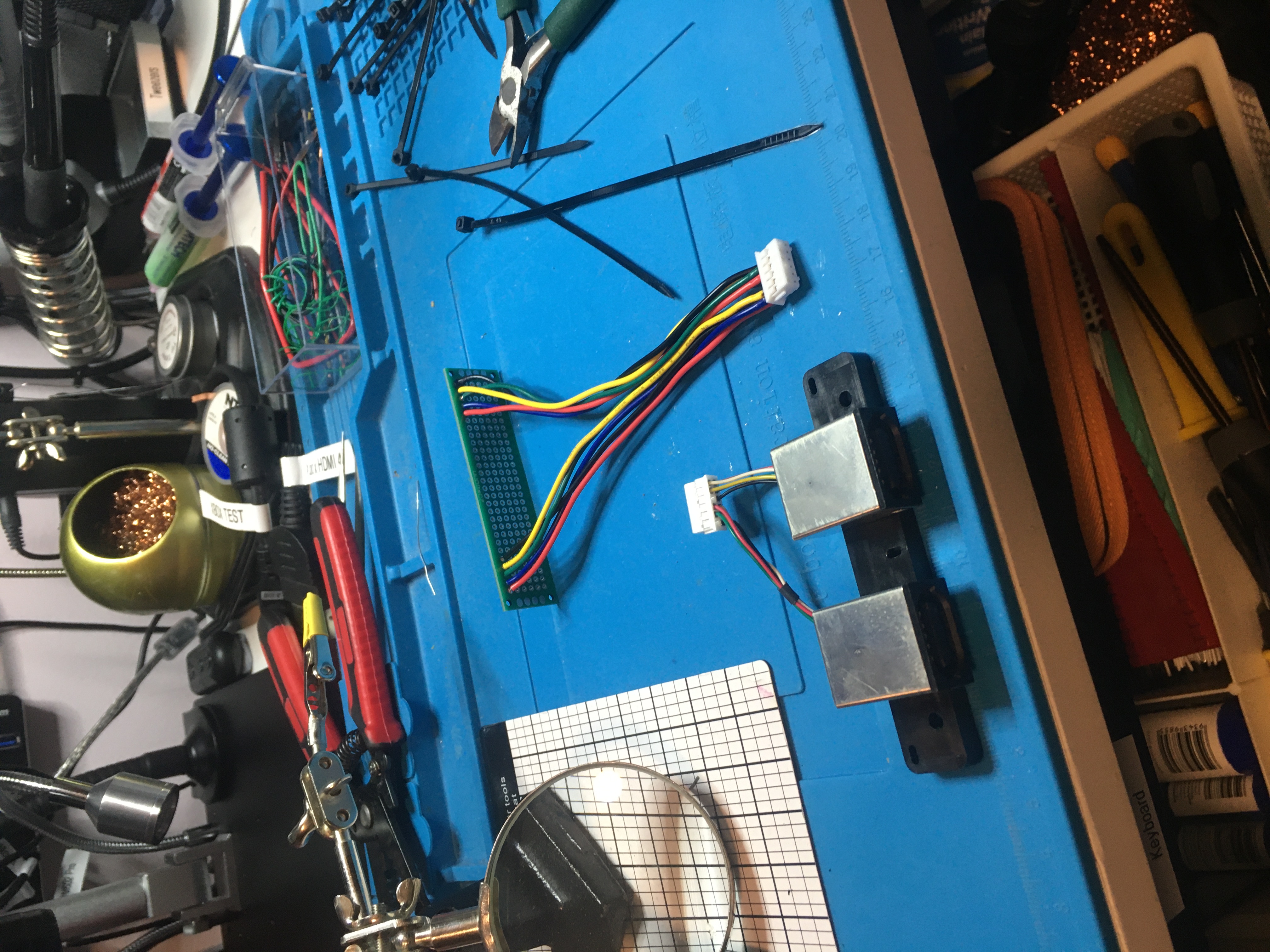 John's work mat with Xbox controller and breakout board