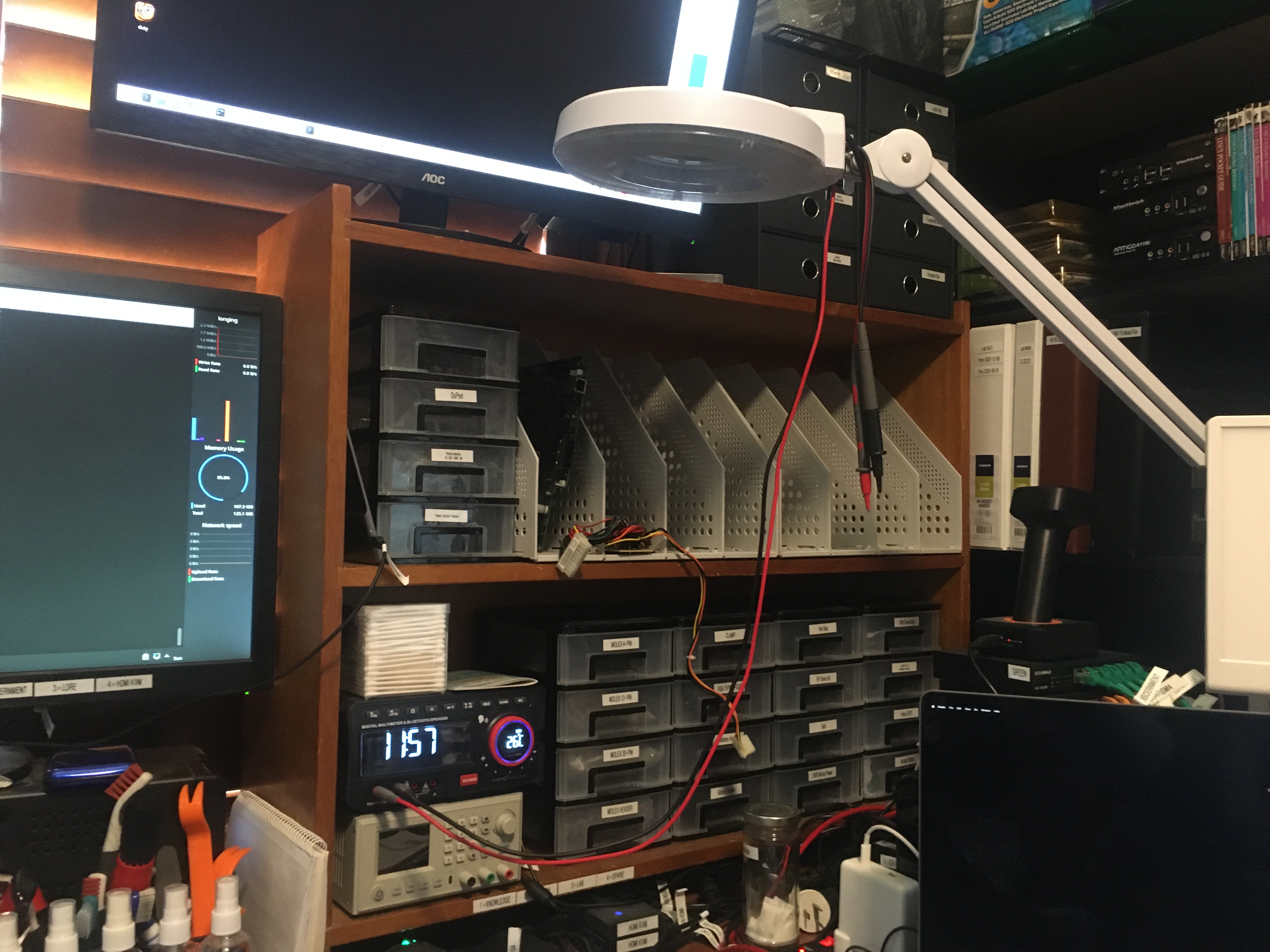 John's shelf with storage for Xbox circuit boards