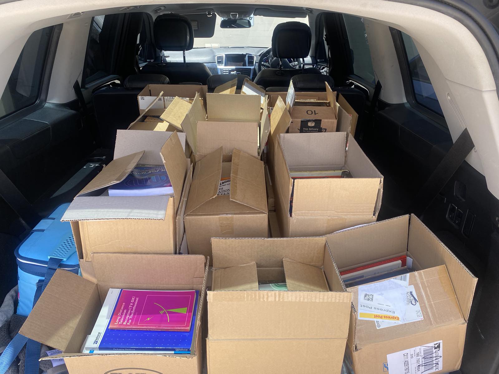 A boot full of old electronics books